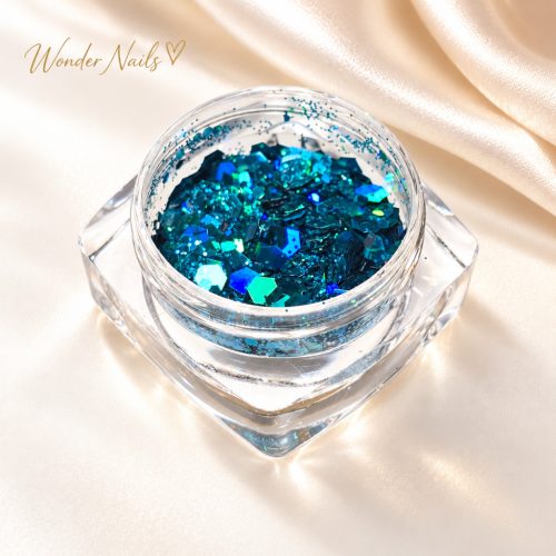 Glitter Mix irizáló petrolkék 43. – nyitott tégelyben, champagne szatén háttéren