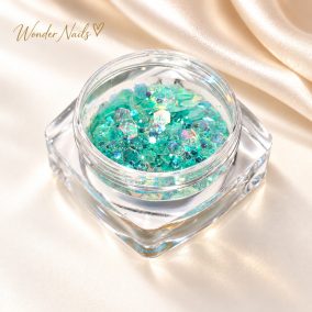 Glitter Mix tengeri habszín 44. – nyitott tégelyben, champagne szatén háttéren