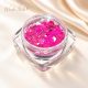 Glitter Mix fukszia 46. – nyitott tégelyben, champagne szatén háttéren
